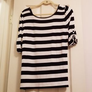 Black and white striped top.